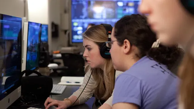 Group of students working at computer